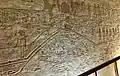 Delicate Bas-hieroglyph reliefs in a long tomb corridor of KV8