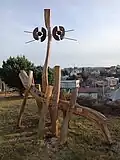 Wooden statue “čumil osminohý” (eight-legged gaper) in Plesná