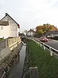 Road by stream