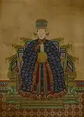 In ceremonial dress