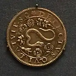 Coin as described.