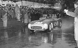 Eugenio Castellotti winning the 1956 Mille Miglia with Ferrari 290 MM