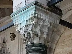 One of the muqarnas-carved capitals in the courtyard