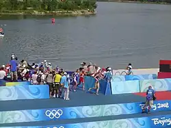 First transition from swimming to cycling: from the right Laura Bennett, Magali di Marco, Sarah Haskins.