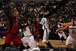 E'Twaun Moore, JaJuan Johnson and Chris Kramer on defense (2009-12-19)