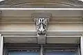 Center corbel detail above one of the windows