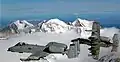 South aspect of Mount Balchen centered. Mount Giddings to left, Mt. Skarland to right, and part of Mt. Geist behind Balchen.