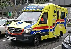 Hong Kong Fire Service ambulance, in its updated yellow livery