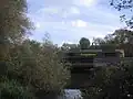 The railway bridge over the mill stream near Port Meadow, north of Oxford railway station and just south of Walton Well Road.