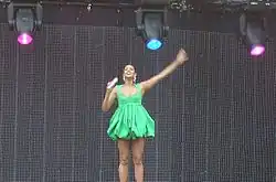 Alesha Dixon in a green dress during the tour.