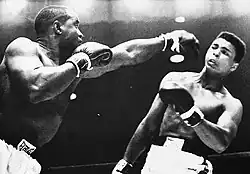 Ali dodging a punch from Liston