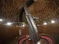 Historic Clark telescope installed in 1896 and housed in a wooden dome resting on automobile tires.