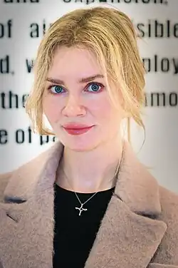 Black-and-white headshot of Delvey.