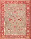 Ushak carpet with a "cloud band" border and field, Mecidi period design