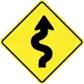 Winding road, first to right