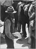 Close-up of relief queue on S.R.A. pay day, Arvin, California, 1940