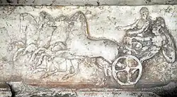 Chariot, armed warrior and his driver. Greece, 4th century BC