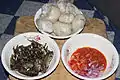 Banku with fried fish and hot pepper