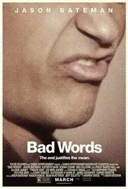 A close-up photo of a man's mouth, with his teeth showing and lower lip sticking out, as if about to utter an expletive