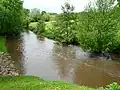 The Bandiat river downstream from the bridge near Ars
