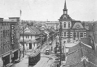 Seventy-seventh Bank building in Sendai (right, ca. 1930)