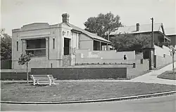 Photograph of a single storey stone building