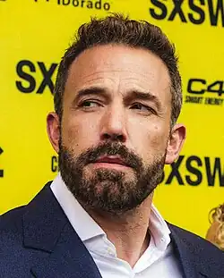 Photograph of Ben Affleck wearing a suit