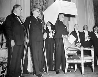 FDR receives a $1&nbsp;million check, proceeds from the first President's Birthday Ball (1934)
