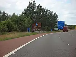 Image 48A sign marking entry to Scotland located on the M6 motorway crossing the border of Cumbria. (from North West England)