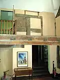 The Entrance Hall, part of the 16th-century farm. A previous division into two floors is still apparent.
