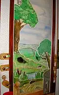 Interactive wildlife pop-up board for young children.