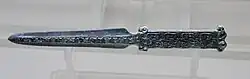 Bronze dagger with motifs of horses from the Xiaoheishigou Site, Upper Xiajiadian culture, early 8th Century BCE. Inner Mongolia Museum.[17][18]