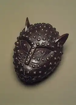 Box in the form of a leopard's head; 19th century; 17.1 x 14&nbsp;cm (63⁄4 x 51⁄2 in.); Brooklyn Museum (New York City). This box was used to hold kola nuts presented to visitors in the royal court of Benin. Leopards are one of the most commonly portrayed animals in African art. Intelligent and courageous, they often serve as metaphors for powerful individuals or associations Relief plaque showing a king (Oba) dominating leopards Artist Royal Bronze-casting Guild (Igun Eronmwon), Edo, Benin kingdom, Nigeria Year c. 1530-1570 Medium Copper alloy Dimensions \37.5 cm&nbsp;cm ×&nbsp;19.1 cm&nbsp;cm (14&nbsp;in ×&nbsp;7&nbsp;in) Location Museum of Fine Arts, Boston Accession L-G 7.23.2012 Website https://collections.mfa.org/objects/558356/relief-plaque-showing-a-king-oba-dominating-leopards?ctx=08604c54-295e-4343-896d-0f59873f9e26&idx=0 Carved leopards Artist Kingdom of Benin Completion date 19th century Medium Ivory with inlaid copper and bronze Accession RCIN 69926 Website https://www.rct.uk/collection/69926/carved-leopards