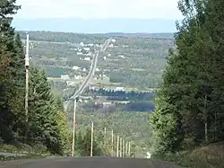 Route 279 climbs appalachian hills near Notre-Dame-Auxiliatrice-de-Buckland.