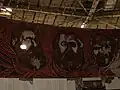 From left to right, mosaics of Friedrich Engels, Karl Marx and Vladimir Lenin