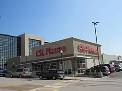 A beige rectangular building with large red CSL Plasma lettering