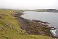 The beach of Camas Mor with some of the houses in Bornesketaig