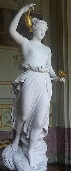 Hebe (mythology) bearing a cup (astr. symbol )