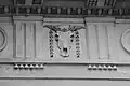 Carved cow's skull with garland