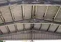 Portal rafters made from C section material supporting Z roof purlins