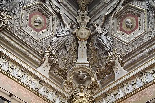 Neoclassical sculpted decoration on the ceiling of the Salon des Sept cheminées, Louvre Palace, Paris, by Francisque Duret, 1851[52]