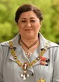 A woman wearing medals