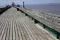 Gangway showing the nameplates along the length and breadth of the pier.