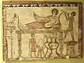 30 B.C. - 324 A.D. (Roman period in Egypt). Reedpipes of unequal length. Tibicen performing for Isis in funerary art from Roman Egypt (Royal Ontario Museum, Toronto).