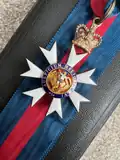Obverse of the CMG badge showing Saint Michael
