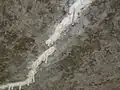 Concrete derived secondary deposit of calcium carbonate creating calthemite stalactites, which can be mistakenly confused with efflorescence.