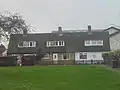 Chalet style terraced houses on First Avenue