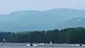 Crystal Lake in summer, with Belknap Mountain in distance