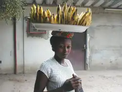 Image 14A woman carrying bananas. (from Culture of the Democratic Republic of the Congo)