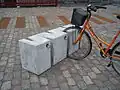 Temporary, moveable bike rack in heavy concrete